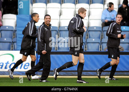 Rangers players during the pre match warm up before their match at Ibrox  Stadium, Glasgow. Picture date: Saturday March 4, 2023 Stock Photo - Alamy