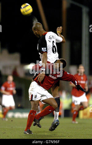 Soccer - FA Barclays Premiership - Fulham v West Bromwich Albion. Fulham's Zak Knight wins the ball in the air from West Bromwich Albion's Robert Earnshaw Stock Photo