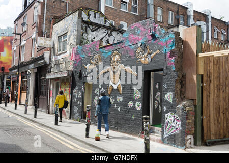Shoppers on Hanbury Street in London's East End. Stock Photo