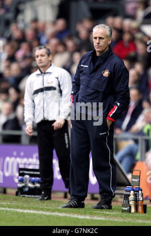 Soccer - Coca-Cola Football League Championship - Derby County v Sunderland. Derby County's manager George Burley (l) and Sunderland's manager Mick McCarthy watch their teams in action Stock Photo