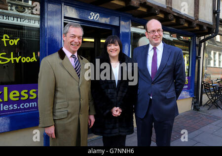 Ukip leader Nigel Farage (left), Ukip health spokesman Louise Bours MEP (centre) with Ukip MP for Rochester and Strood Mark Reckless stop outside the constituency office in Rochester, Kent, as they prepare to unveil the Ukip health policy for the upcoming general election. Stock Photo