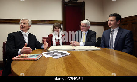 The family of Lance Corporal Joshua Leakey; his parents Mark (2nd right) and Rosie Leakey and brother Ben Leakey (right) and Lieutenant General David Leakey, the Gentleman Usher of the Black Rod (left) in London. Stock Photo