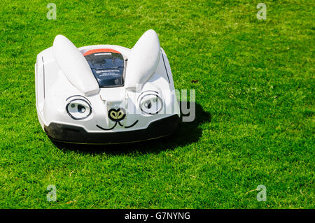 A Husqvarna robotic grass and lawn mower disguised as a rabbit. Stock Photo