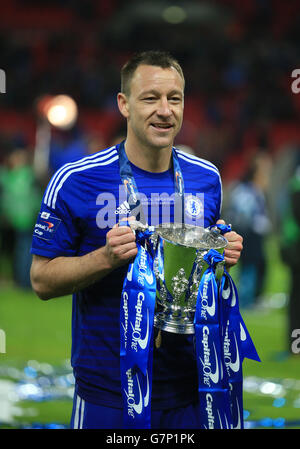 Soccer - Capital One Cup - Final - Chelsea v Tottenham Hotspur - Wembley Stadium. Chelsea's John Terry celebrates with the trophy Stock Photo