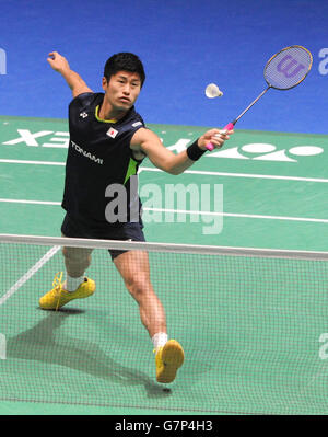 Japan's Sho Sasaki plays a shot during day two of the 2015 Yonex All England Badminton Championships at the Barclaycard Arena, Birmingham. Stock Photo