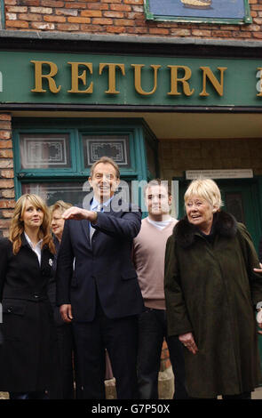 British Prime Minister Tony Blair with characters from television soap Coronation Street on the set. Stock Photo