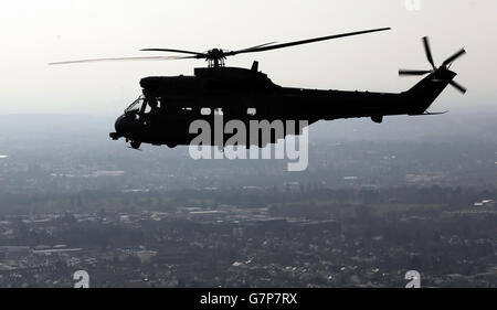 Helicopter stock. An RAF Puma helicopter from at RAF Benson flies over Oxfordshire. Stock Photo