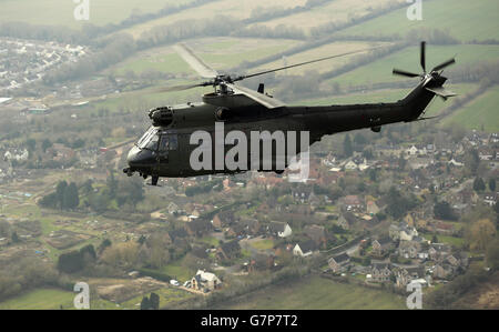 Helicopter stock. An RAF Puma helicopter from at RAF Benson flies over Oxfordshire. Stock Photo