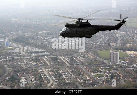 An RAF Puma helicopter from at RAF Benson flies over Oxfordshire. Stock Photo