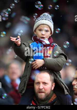 A young West Ham United fan before the Barclays Premier League match at Upton Park, London. PRESS ASSOCIATION Photo. Picture date: Saturday February 28, 2015. See PA story SOCCER West Ham. Photo credit should read: Nick Potts/PA Wire. Stock Photo