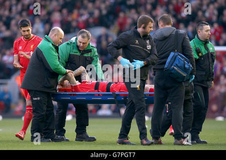 Liverpool's Emre Can reacts as Martin Skrtel is treated by the medics ...