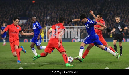 Chelsea's Diego Costa drives into the penalty box before being tackled by Paris St Germain's Edison Cavani (left), Thiago Silva and Marquinhos (right) Stock Photo