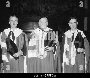 Lord Ferrier (c), formerly Victor Ferrier Noel-Paton, pictured with his sponsors when he was introduced at a special sitting of the House of Lords. His sponsors are Lord Clydesmuir (l) and Lord Polwarth (r). Today's was the second of the two special sittings of the Lords, held to enable the new life peers and peeresses to take their places for the State opening of Parliament. Stock Photo