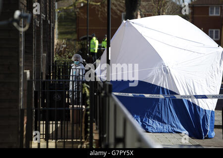 Forensic officers continue to work inside a house on Cotton Mill Lane in Bristol, as seven people remain in custody in connection with the investigation into the disappearance of teenager Becky Watts following the discovery of body parts yesterday. Stock Photo