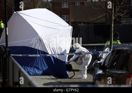 Forensic officers continue to work inside a house on Cotton Mill Lane in Bristol, as seven people remain in custody in connection with the investigation into the disappearance of teenager Becky Watts following the discovery of body parts yesterday. Stock Photo