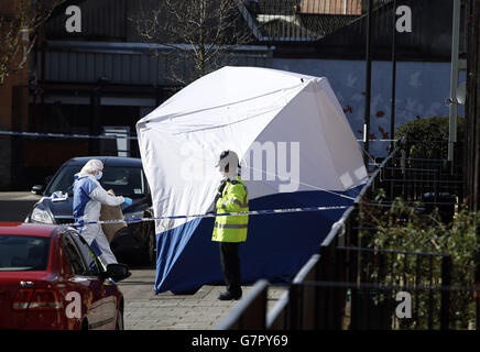 Forensic officers continue to work inside a house on Cotton Mill Lane in Bristol, as seven people remain in custody in connection with the investigation into the disappearance of teenager Becky Watts following the discovery of body parts yesterday. Stock Photo