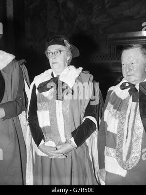 Baroness Wootton of Abinger, one of the new life peeresses, pictured in her robes at the House of Lords where she took the oath at a special sitting. Lady Wootton, formerly Mrs Barbara Wootton, is one of the first 14 life peers and peeresses to be created. She is 60 years old and was formerly Professor of Social Studies at the University of London. A prominent socialist, she has served on the BBC Board of Governors and on a Royal Commission. Stock Photo