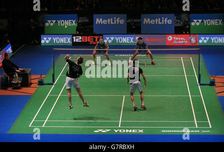 Denmark's Mathias Boe (front left) and Casten Mogensen (front right) during the Mens Doubles beating China's Fu Haifeng and Zhang Nan during The Yonex All England Open 2015 Stock Photo