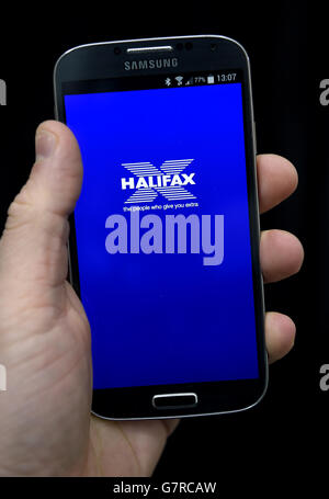 The Halifax banking app is used on a Samsung Galaxy S4. Stock Photo