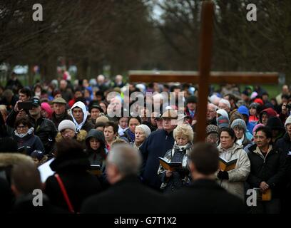 Participants during the annual Good Friday 'Way of the Cross' procession from the Wellington Monument to the Papal Cross in the Phoenix Park, Dublin. Stock Photo