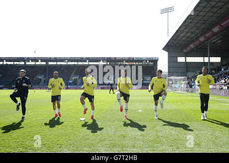 Tottenham Hotspur players warm up before the Barclays Premier League match at Turf Moor, Burnley. PRESS ASSOCIATION Photo. Picture date: Sunday April 5, 2015. See PA story SOCCER Burnley. Photo credit should read: Lynne Cameron/PA Wire. Stock Photo