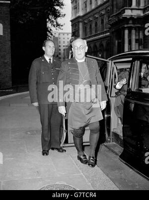 Dr. Geoffrey Fisher, the Archbishop of Canterbury, pictured as he arrives at 10 Downing Street, when 21 Archbishops and Metropolitans of the Anglican Communion who are attending the Lambeth Conference, had dinner with the Prime Minister. They were 'paired' with 21 distinguished laymen. Stock Photo