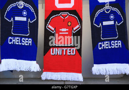 Chelsea and Manchester United scarfs on sale before the Barclays Premier League match at Stamford Bridge, London. PRESS ASSOCIATION Photo. Picture date: Saturday April 18, 2015. See PA story SOCCER Chelsea. Photo credit should read: Nick Potts/PA Wire. Stock Photo