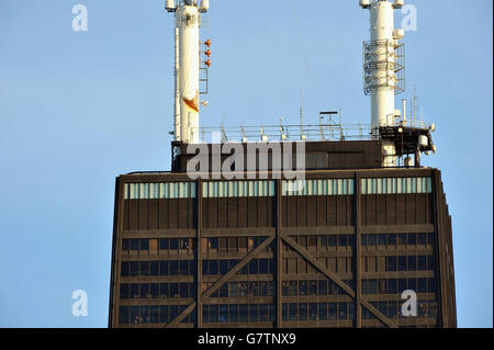 Closeup of the very top of one of Chicago's most noted skyscrapers, the John Hancock Building. Chicago, Illinois, USA. Stock Photo