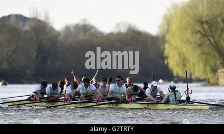 The Cambridge team (front) look dejected after they lose the 2015 BNY Mellon Boat Race on the Thames, in London. Stock Photo