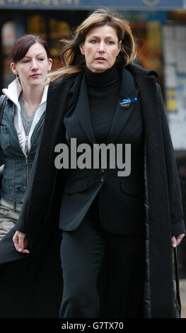 Mary Wragg arrives at Lewes Crown Court in Sussex, supported by family members for the trial of husband Andrew Wragg as he faces charges relating to the death of their son Jacob. Stock Photo