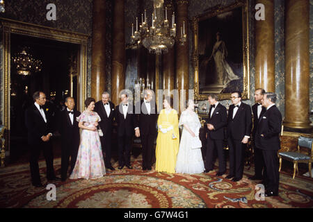 The Queen and members of the Royal Family in the Blue Drawing Room at Buckingham Palace, as they entertained seven world leaders in London for the Downing Street Summit talks. (l-r) Pierre Trudeau (Canada), Takeo Fukuda (Japan), Princess Margaret, James Callaghan, Prince Charles, Giscard d'Estaing (France), Queen Elizabeth II, the Queen Mother, President Carter (USA), Giulio Andreotti (Italy), Prince Philip and Helmut Schmidt (West Germany.) Stock Photo