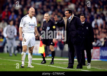 Real Madrid's coach Vanderlei Luxemburgo gives instructions to Thomas Gravesen Stock Photo
