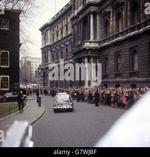 Welcoming crowds lining Downing Street as the car bearing Harold Wilson and his wife arrives at No. 10. The Prime Minister had returned from Liverpool already assured of a large majority in the new parliament. Stock Photo
