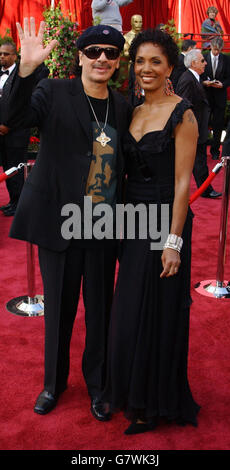 77th Academy Awards - Kodak Theatre. Carlos Santana and wife Debra arrive. Stock Photo