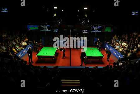 Snooker - Betfred World Championship - Day Twelve - Crucible Theatre. Neil Robertson (left) and Stuart Bingham in action during day twelve of the Betfred World Championships at the Crucible Theatre, Sheffield. Stock Photo