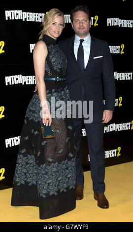 Elizabeth Banks and her husband Max Handelman attending a special screening of Pitch Perfect 2 at the May Fair Hotel, London. Stock Photo
