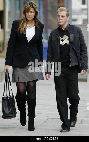 Ricky Challenger (right) a carer for Jacob Wragg arrives with Mary Wragg. Stock Photo