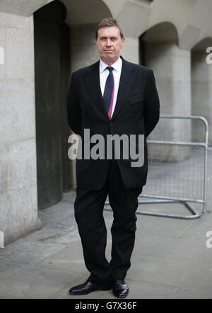 Former News of the World royal editor Clive Goodman speaking outside the Old Bailey, central London, after he was formally cleared of paying public officials for stories. Stock Photo