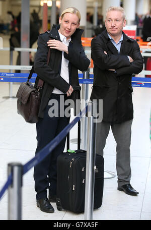 SNP's Mhairi Black MP the 20-year-old who ousted Labour frontbencher Douglas Alexander in the recent General Election arrives at Glasgow Airport with her father Alan as she joins other new SNP MPs as they travel to Westminster in London.