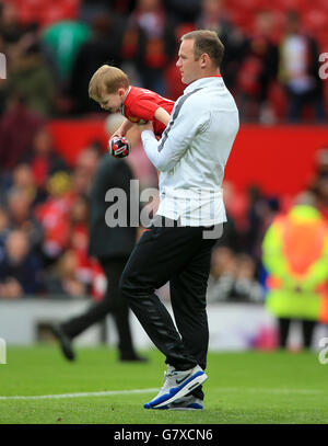 Manchester United's Wayne Rooney and his son Klay following the Barclays Premier League match at Old Trafford, Manchester. PRESS ASSOCIATION Photo. Picture date: Sunday May 17, 2015. See PA story SOCCER Man Utd. Photo credit should read: Nick Potts/PA Wire. Stock Photo