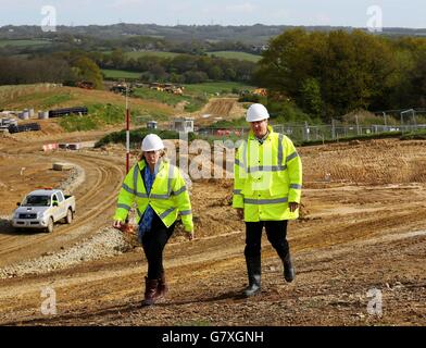 Prime Minister David Cameron (right) with Amber Rudd, Conservative parliamentary candidate for Hastings and Rye, during a General Election campaign visit to the development of the Bexhill to Hastings link road in East Sussex. Stock Photo