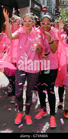 EDITORIAL USE ONLY Television and radio presenter Sarah-Jane Crawford (right) takes part in a Bold is Beautiful march in central London, organised by Benefit Cosmetics to raise money for Look Good Feel Better and Refuge. Stock Photo