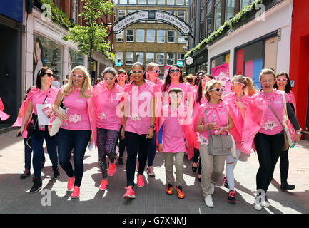 Television and radio presenter Sarah-Jane Crawford (centre) takes part in a Bold is Beautiful march in central London, organised by Benefit Cosmetics to raise money for Look Good Feel Better and Refuge. Stock Photo