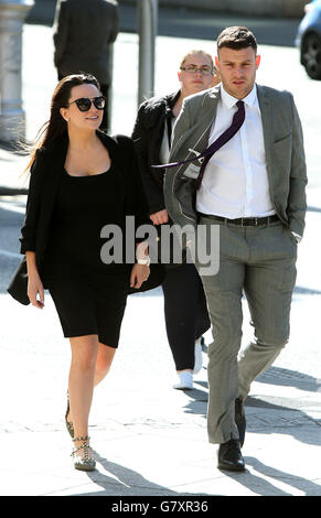 Footballer Anthony Stokes arrives with long-term girlfriend Debbie Lawlor at Dublin's Circuit Criminal Court where he has been ordered before a court again next year over an alleged assault of an Elvis impersonator. Stock Photo