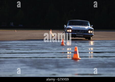 (160627) -- MOSCOW, June 27, 2016 (Xinhua) -- A car is seen during 'Bosch Moskau Klassik rally' racing in Moscow, capital of Russia, on June 26, 2016. A classic car racing named 'Bosch Moskau Klassik rally' kicked off in Moscow this Sunday. It attracted hundreds of classic cars from 1910s to 1980s including cars of several brands from Germany, Italy, the United States and Russia. (Xinhua/Evgeny Sinitsyn) Stock Photo