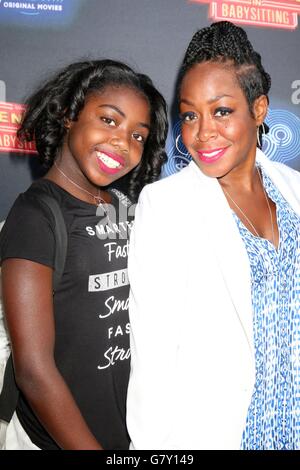 Alijah Kai Haggins and Tichina Arnold attend the arrivals of the “56th
