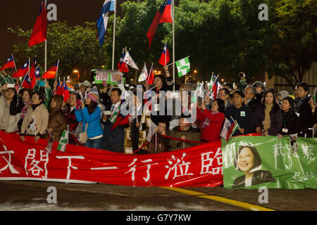 Asuncion, Paraguay. 27th June, 2016. Taiwanese expatriates in Paraguay, Brazil and Argentina wave flags as they wait Taiwan's President Tsai Ing-wen at Silvio Pettirossi International Airport, Luque, Paraguay. Credit:  Andre M. Chang/ARDUOPRESS/Alamy Live News Stock Photo