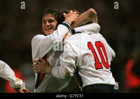 David Beckham (left) and Teddy Sheringham (right) of England celebrate the opening goal Stock Photo