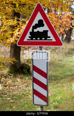 Traffic sign with a steam engine, railroad crossing, Drei-Annen-Hohne, Brocken Mountain, Harz National Park, Saxony-Anhalt Stock Photo