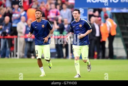 (left to right) Barcelona's Neymar and Lionel Messi emerge for the warm up before the Champions League semi final match against Bayern Munich Stock Photo